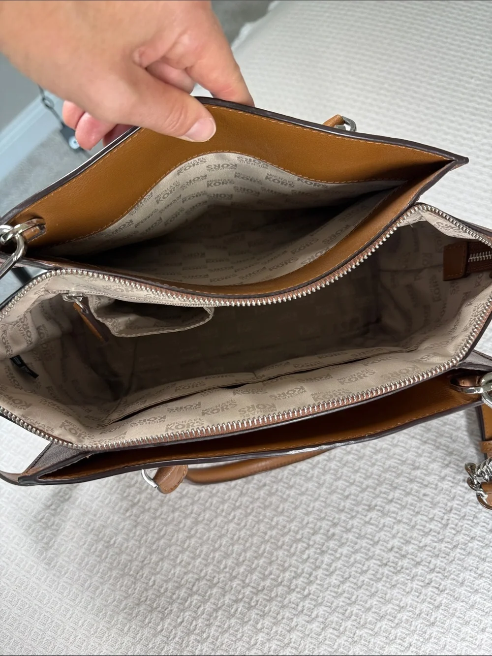 Michael Kors saddle tan saffiano leather satchel with silver hardware